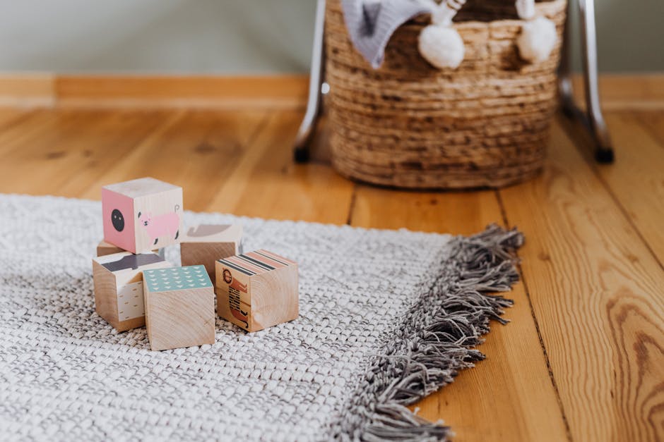 Colorful wooden blocks on woven rug in a cozy indo